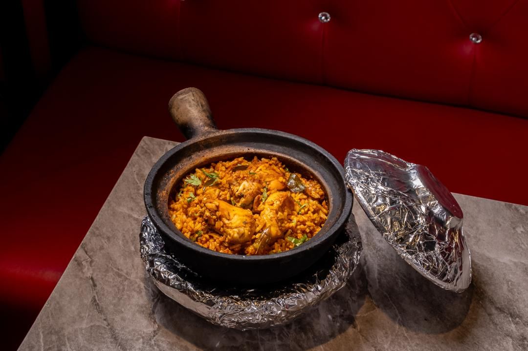 Chicken claypot rice served at the booth