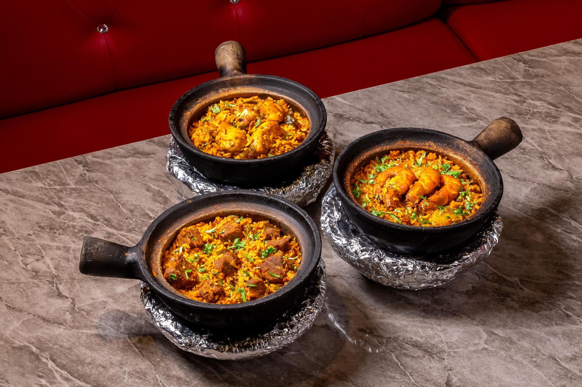 Chicken, mutton and prawn claypot rice