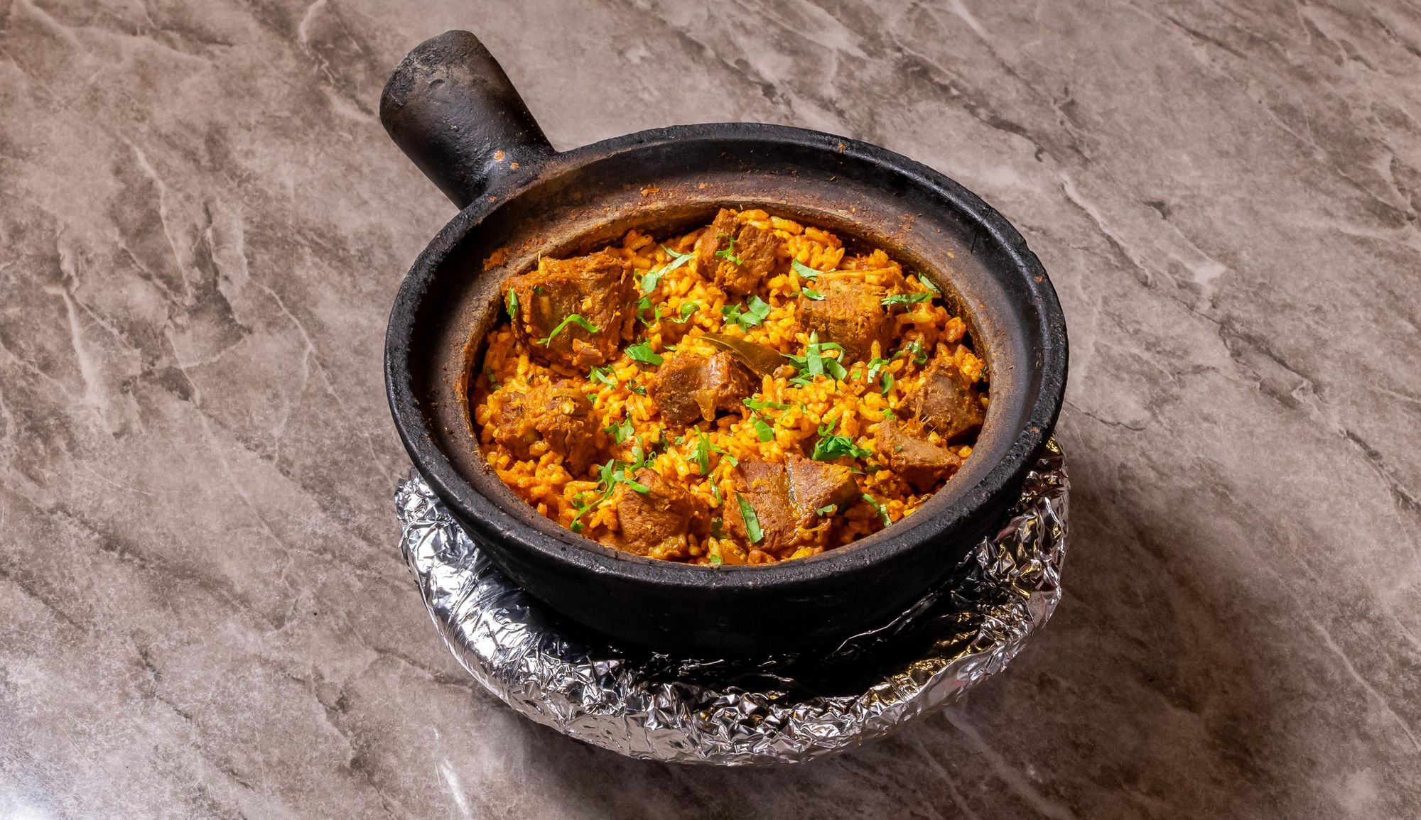 Mutton claypot rice, fresh from the fire